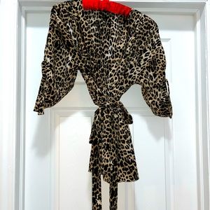 Leopard belted peplum top
